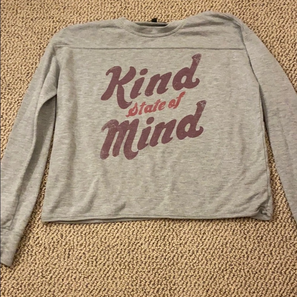 Long sleeve T-shirt that reads kind state of mind